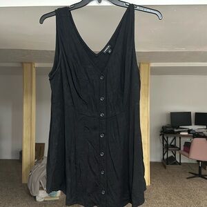 Black button peplum tank